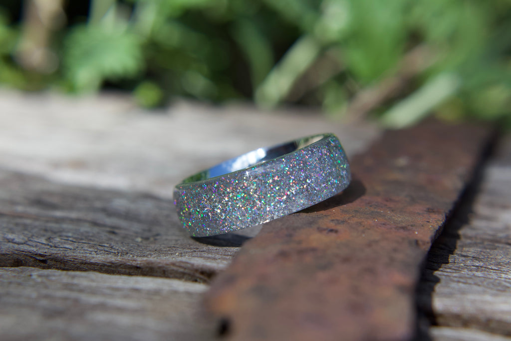 Silver diamond infused ring with silver sparkle on stainless steel