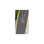 Load image into Gallery viewer, Paw Print Hollow Heart Pendant
